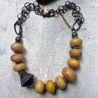 Old Golden Beads by Debe Dohrer